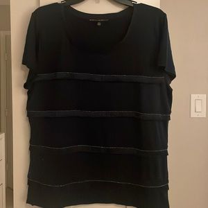Women Short Sleeve Navy Blue Top with Fringe and Gold Lining across.